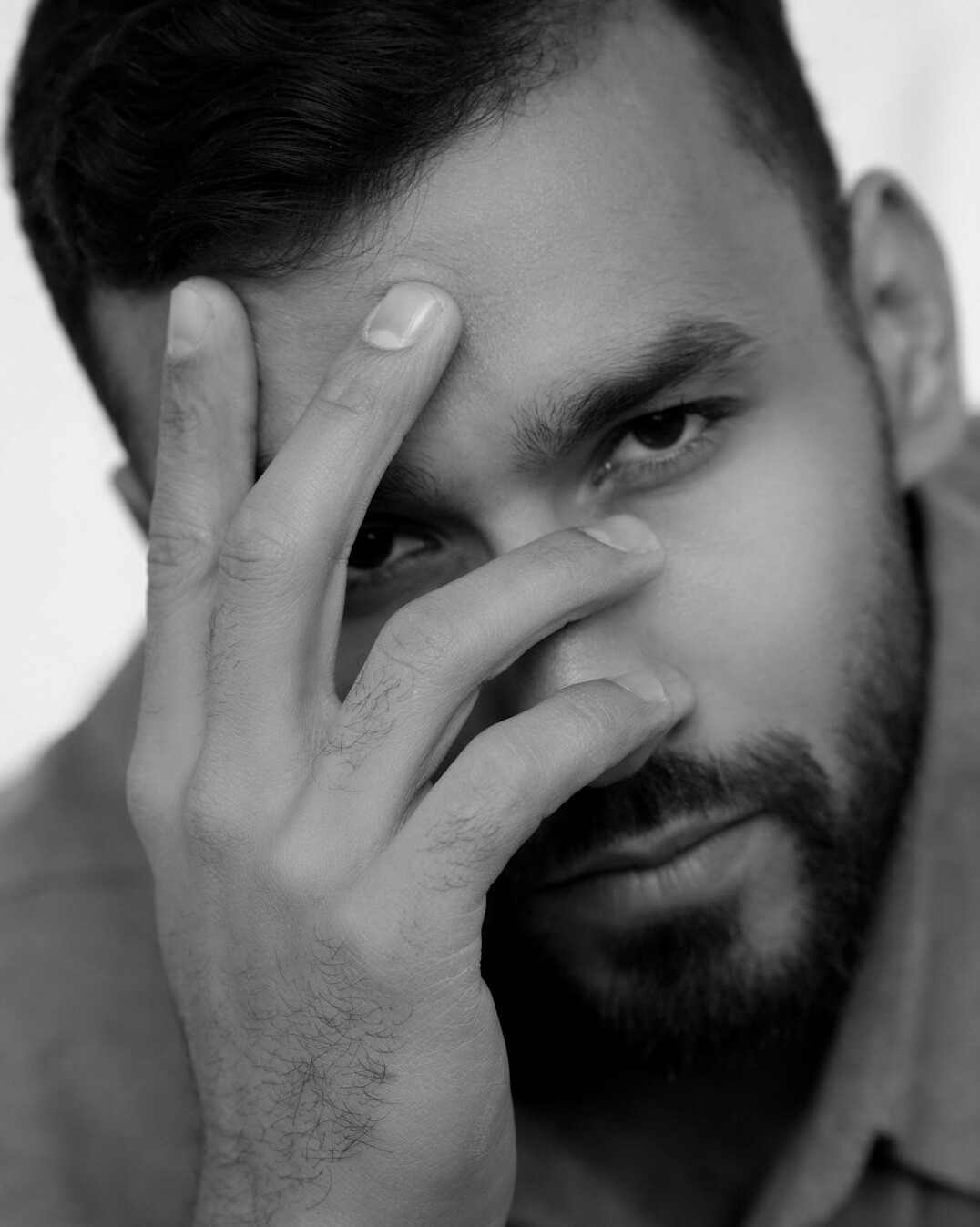 Portrait of a bearded man looking at the camera