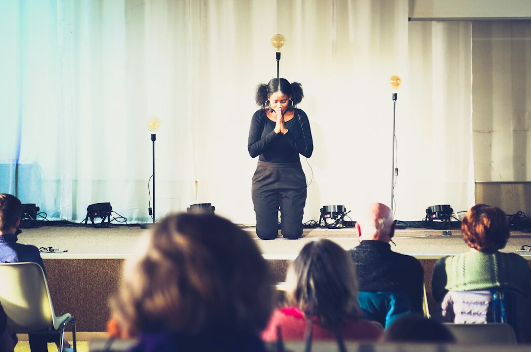confident speaker on stage