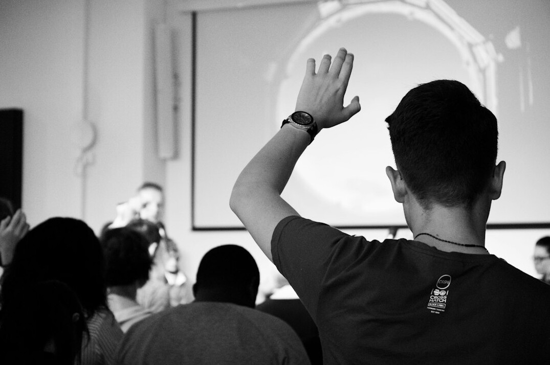 person giving presentation on stage