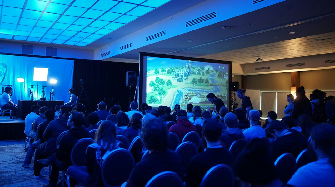 person giving presentation on stage