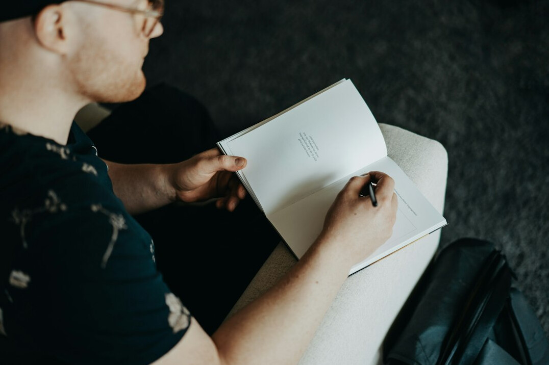 person journaling thoughts